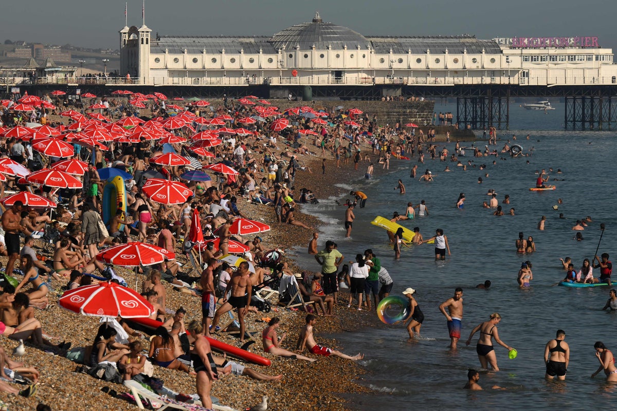 UK Weather: Britain set to bask in 30C mini-heatwave before dreary ...