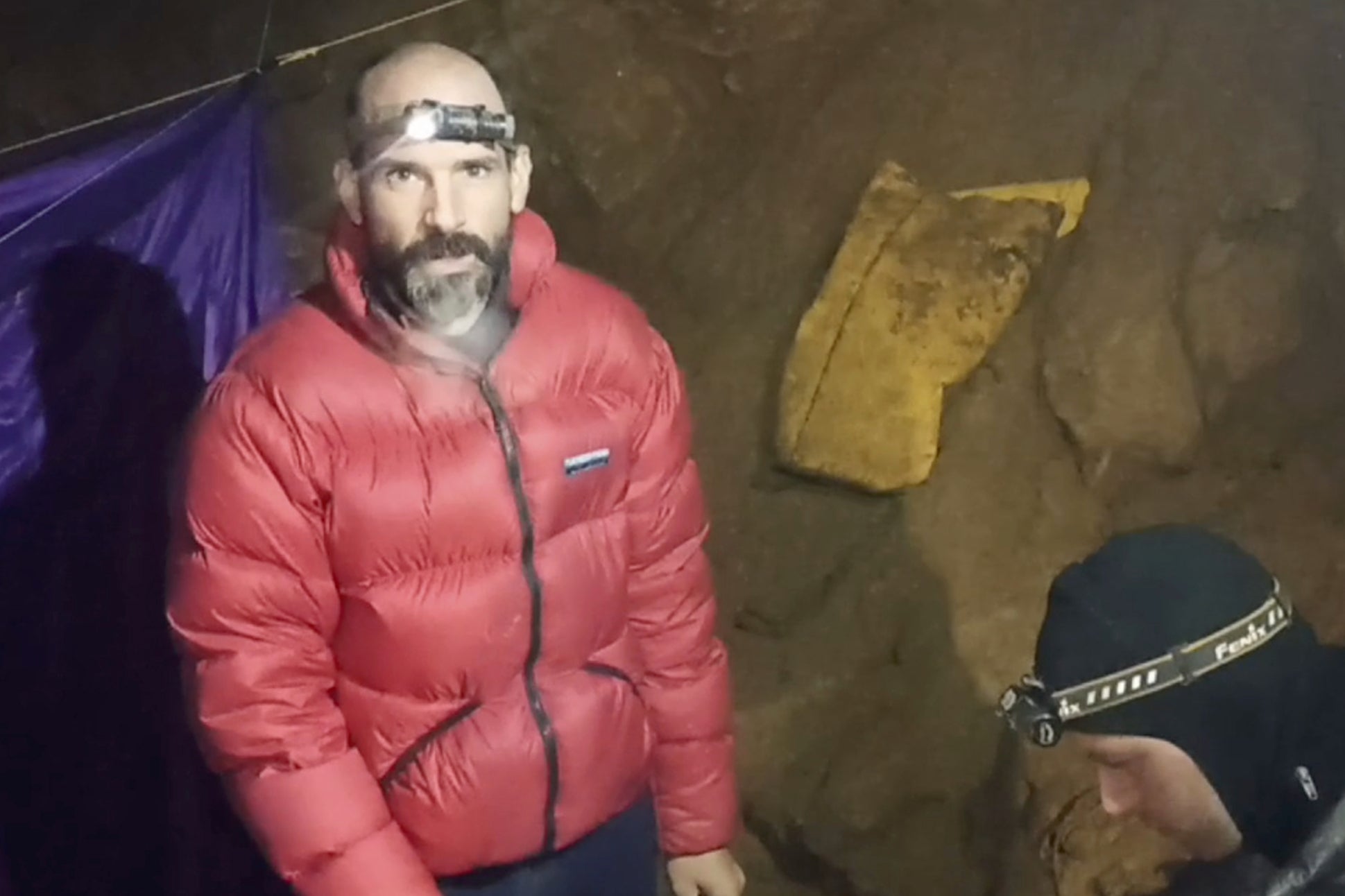 In this screen grab from video, American caver Mark Dickey, 40, talks to camera inside the Morca cave