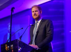 Prince Harry says Queen is ‘looking down on us all’ on flying visit to UK without Meghan