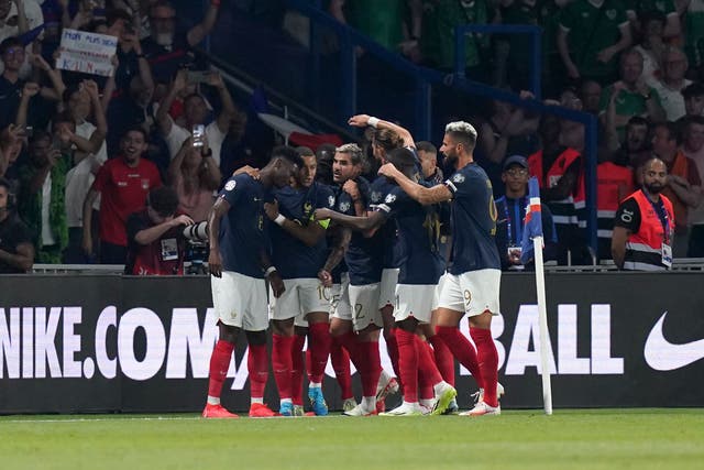 France’s players celebrate after Aurelien Tchouameni scores the opening goal (Adam Davy/PA)