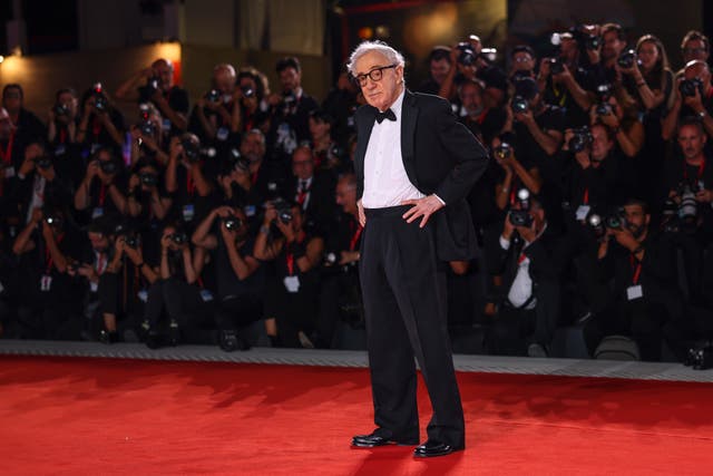 <p>Woody Allen poses for photographers upon arrival for the premiere of the film 'Coup de Chance' during the 80th edition of the Venice Film Festival</p>