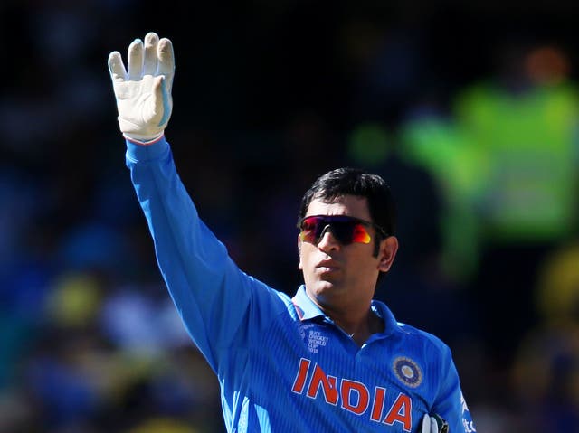 <p>File: Former Indian captain MS Dhoni gestures to his fielders during their Cricket World Cup semifinal against Australia in Sydney</p>