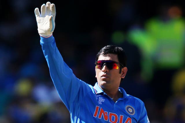 <p>File: Former Indian captain MS Dhoni gestures to his fielders during their Cricket World Cup semifinal against Australia in Sydney</p>