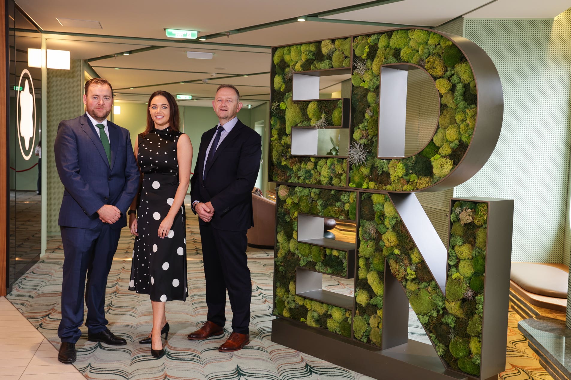 Group managing directors Conleth McConville and Naoimh McConville with CEO Gary Annett (MJM/PA)