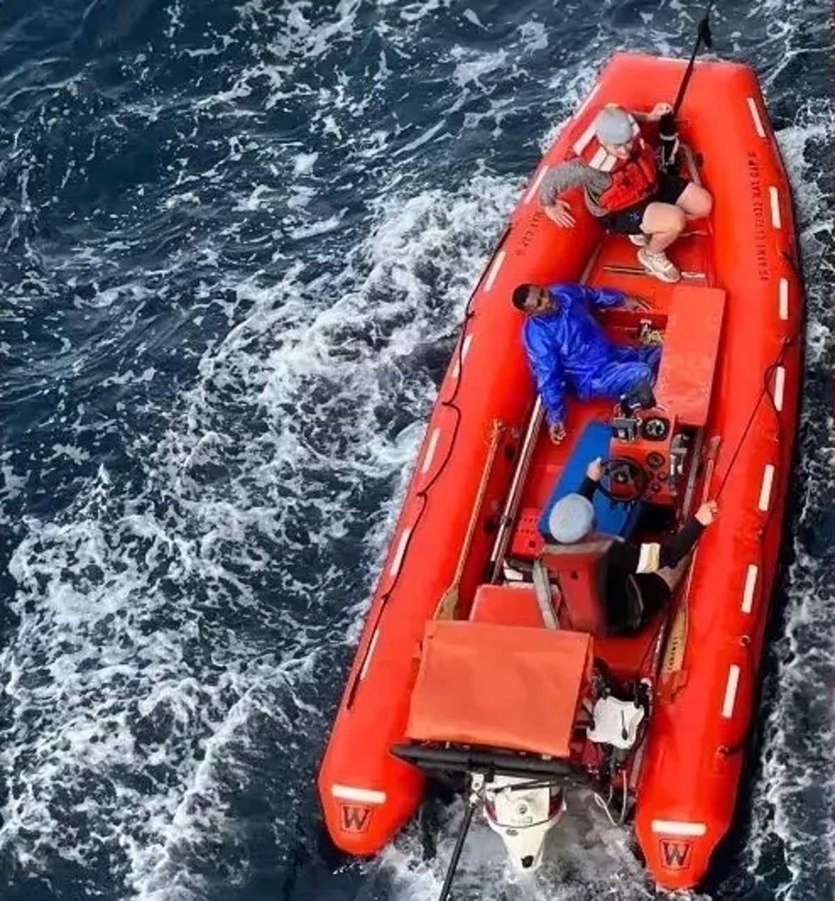 US forces rescue man found clinging to cooler lid ten miles out at sea