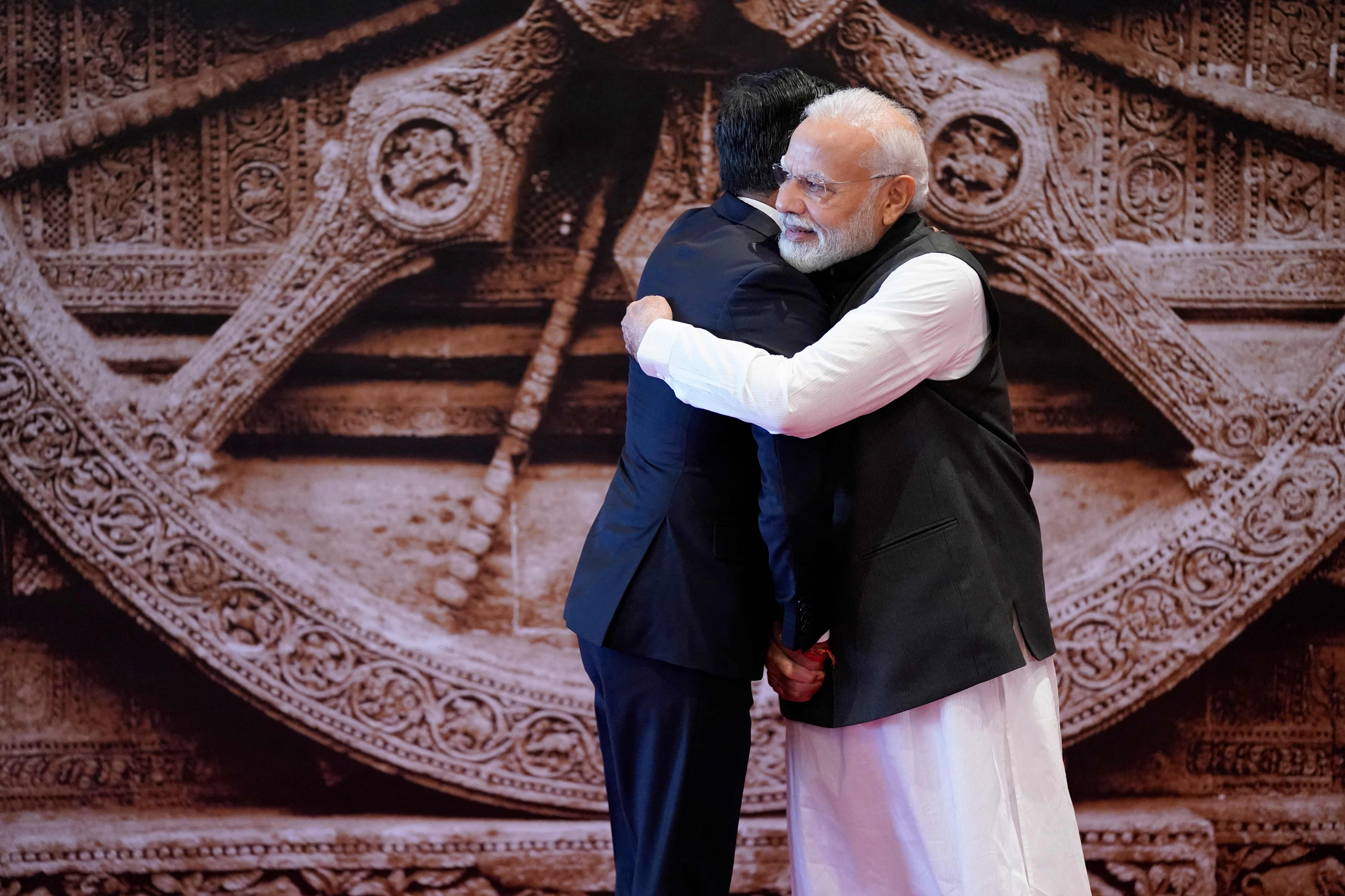 Narendra Modi hugs Rishi Sunak on Saturday