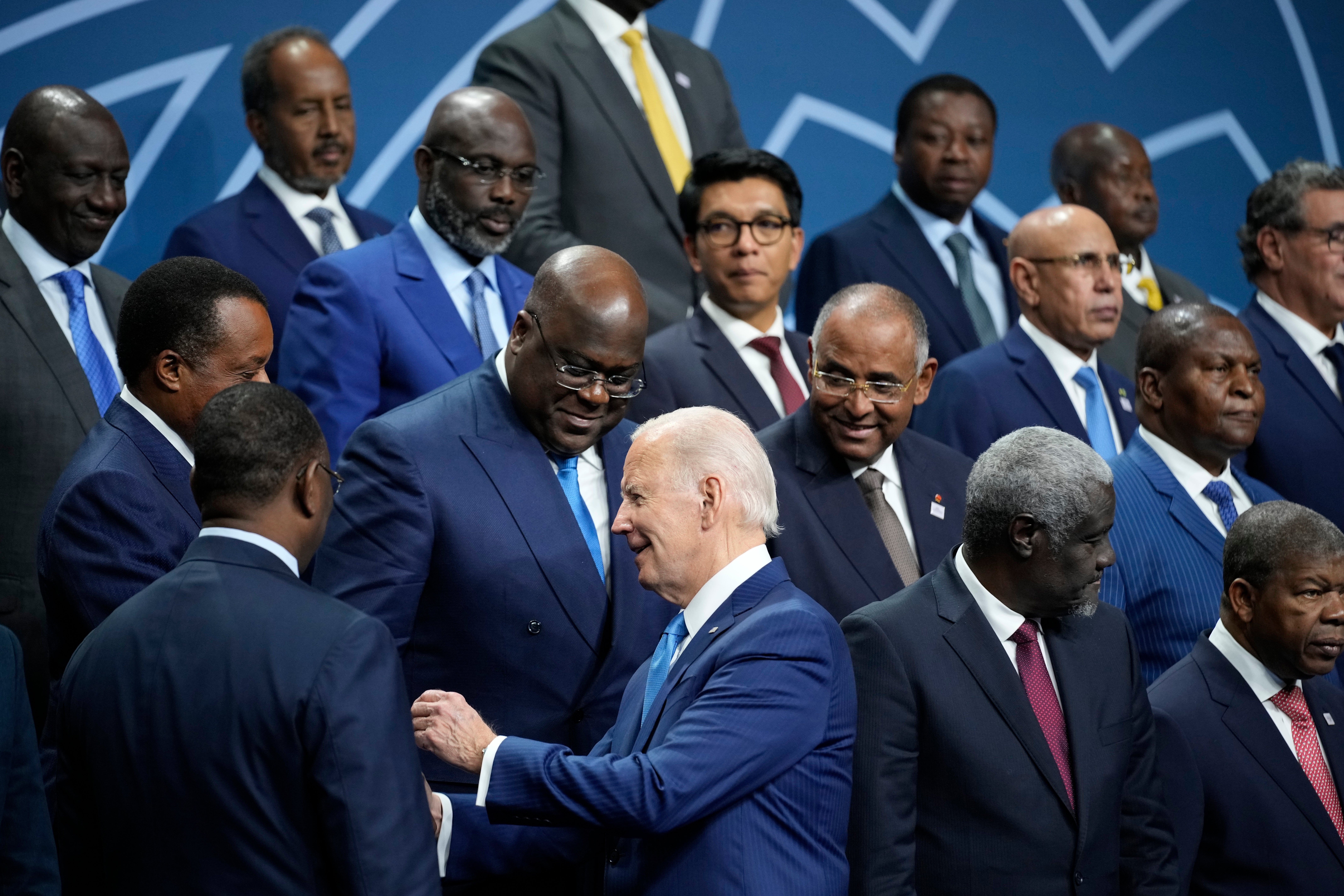 <p>US president Joe Biden talks with African leaders before they pose for a family photo during the US-Africa Leaders Summit at the Walter E Washington Convention Center in Washington, 15 December 2022</p>