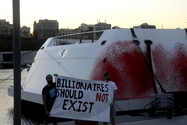 <p>Climate change activistis spray red paint on superyacht belonging to Walmart heiress worth nearly $10bn  </p>