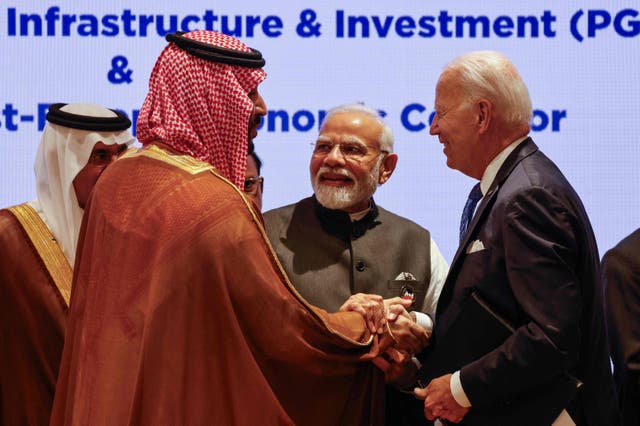 <p>Saudi Arabia's crown crince Mohammed bin Salman, left, India's prime minister Narendra Modi, centre, and Joe Biden attend a session as part of the G20 Leaders' Summit</p>