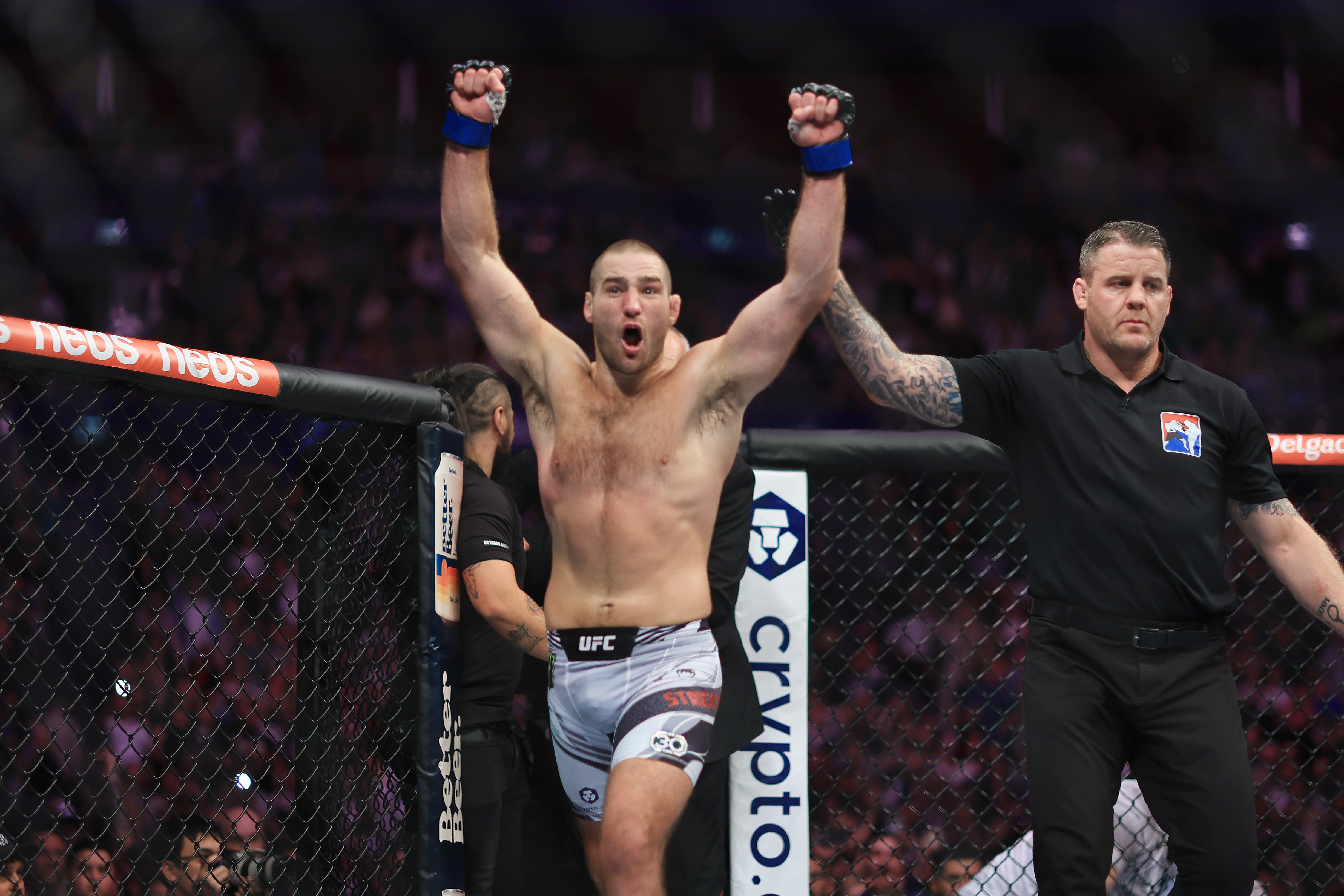 Sean Strickland celebrates winning the UFC middleweight title from Israel Adesanya