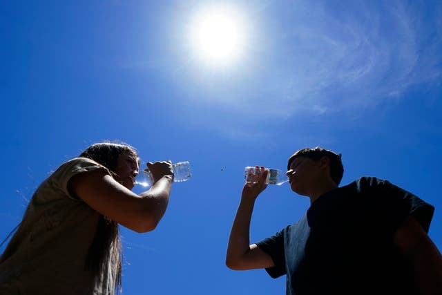 <p>Residents of Phoenix pause for a cold drink doing July’s record-breaking heat wave </p>
