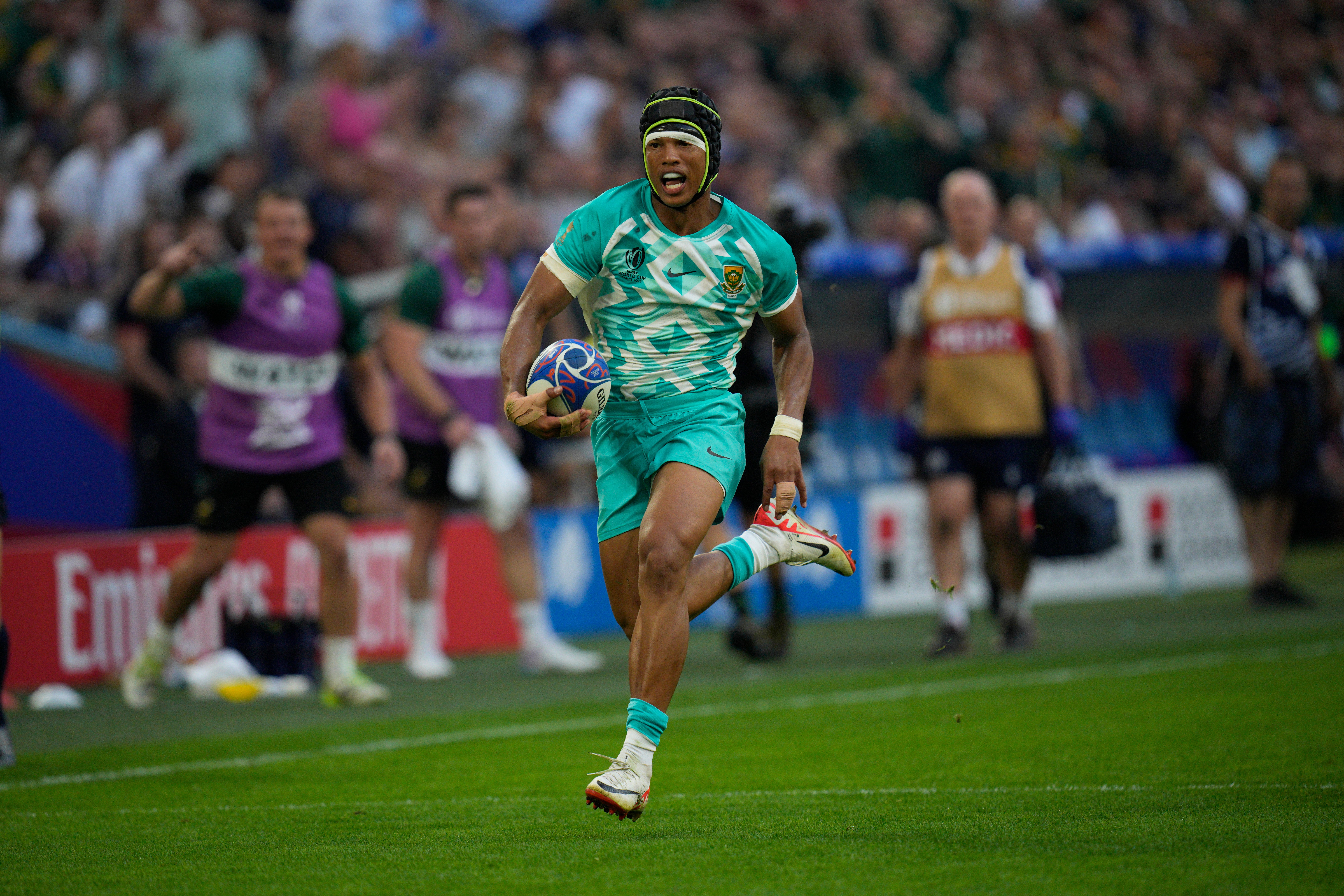South Africa's Kurt-Lee Arendse runs to scores a try