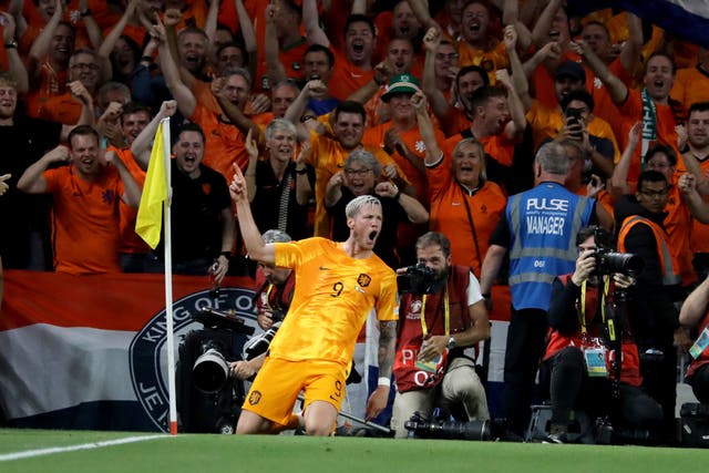 Wout Weghorst celebrates after scoring the Netherlands’ winner (Donall Farmer/PA)