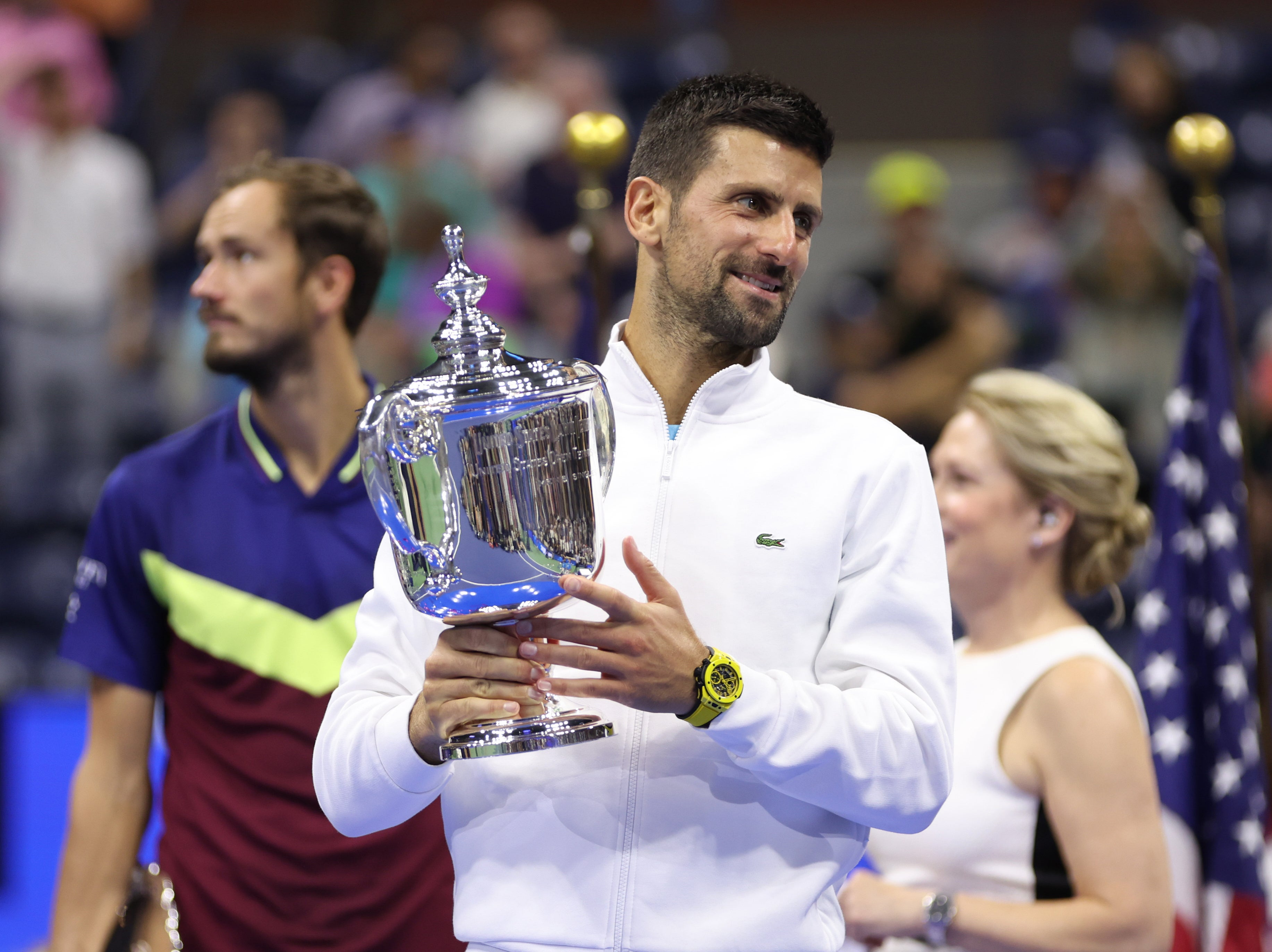 Novak Djokovic celebrates after defeating Daniil Medvedev