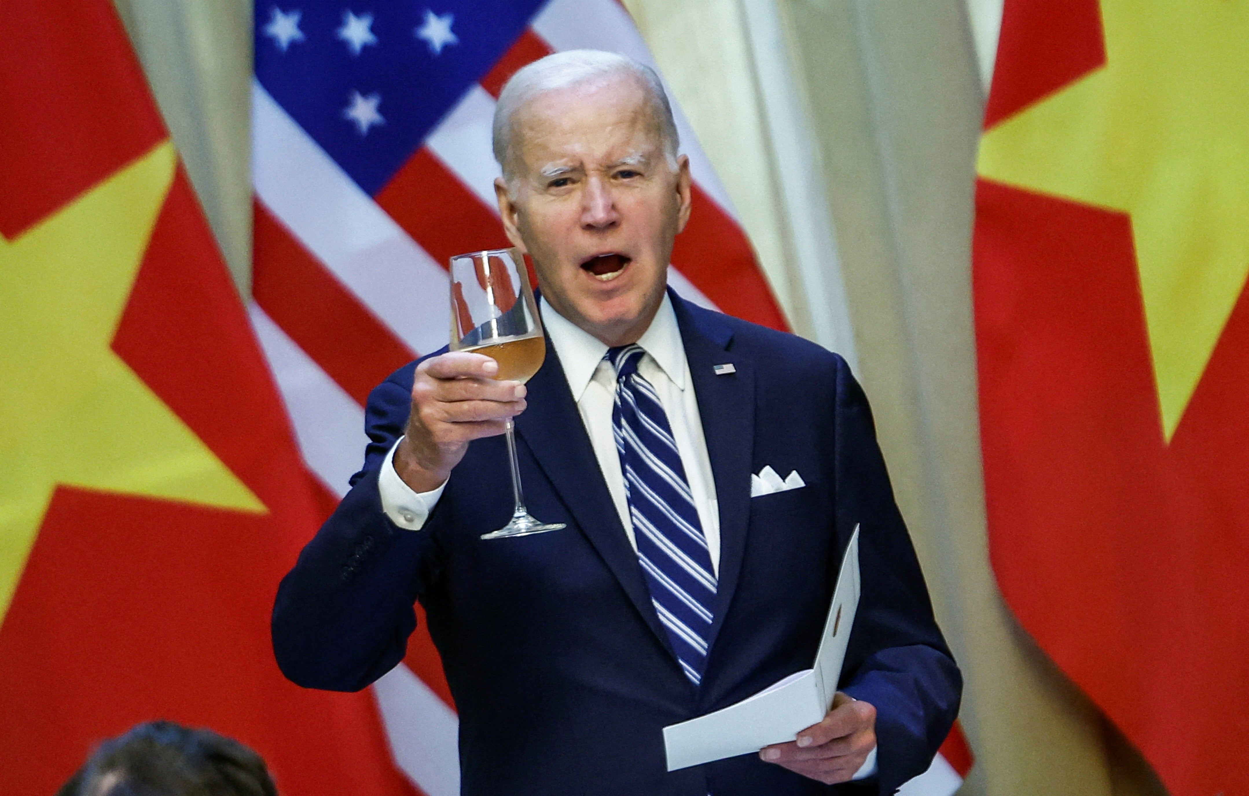 <p>Joe Biden raises a toast in Vietnam</p>