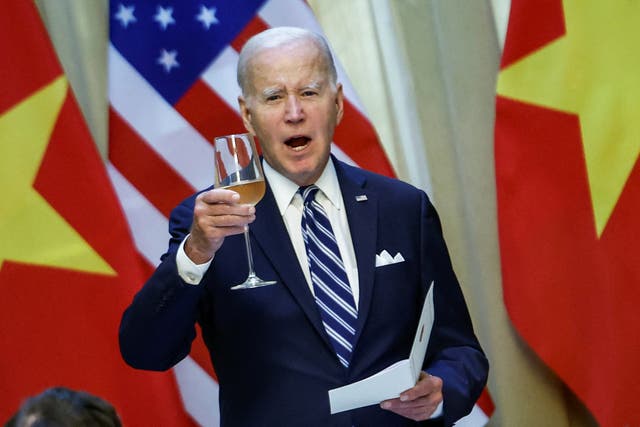 <p>Joe Biden raises a toast in Vietnam</p>