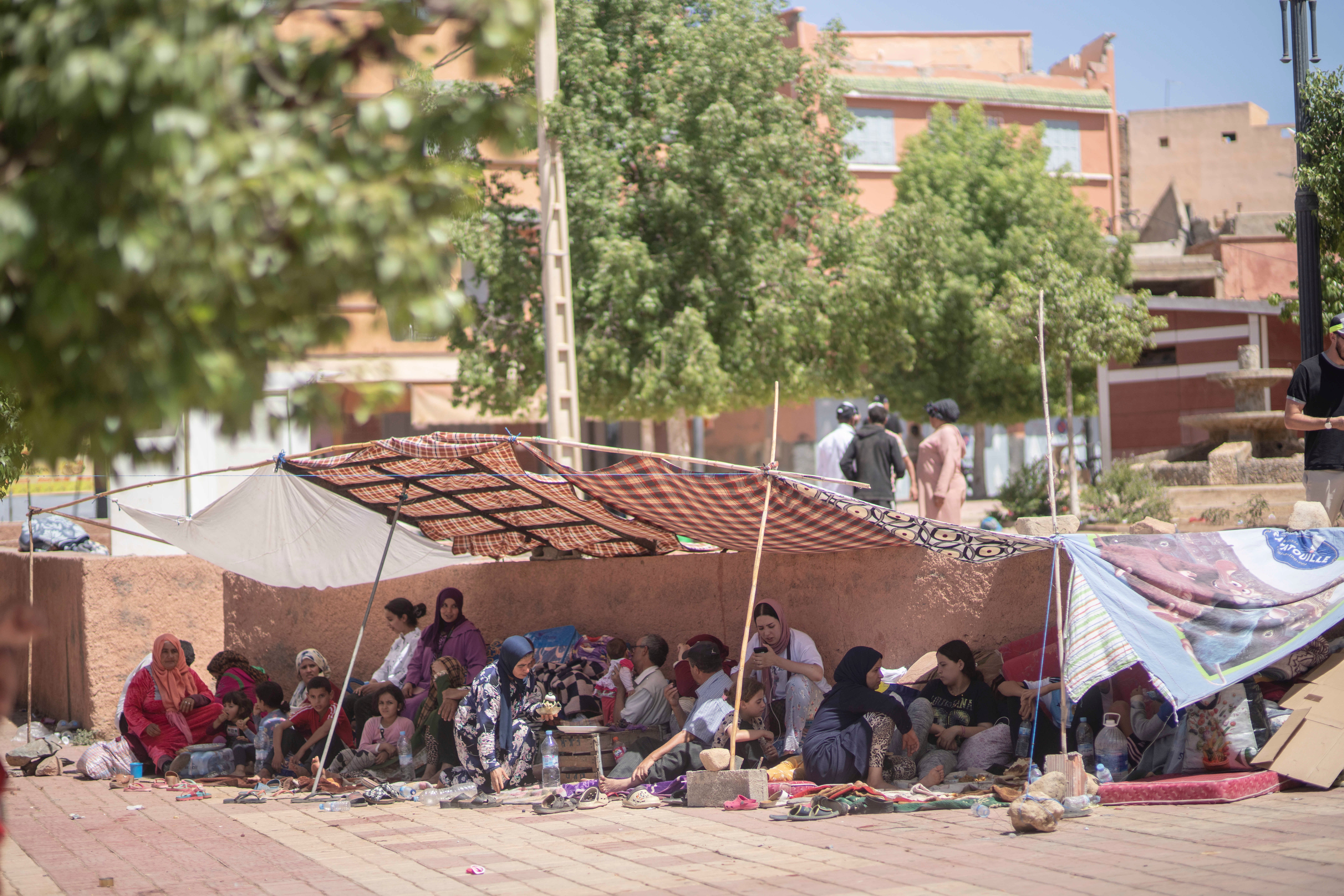 People shelter in tents after their homes were damaged by the earthquake, in the town of Amizmiz, near Marrakech