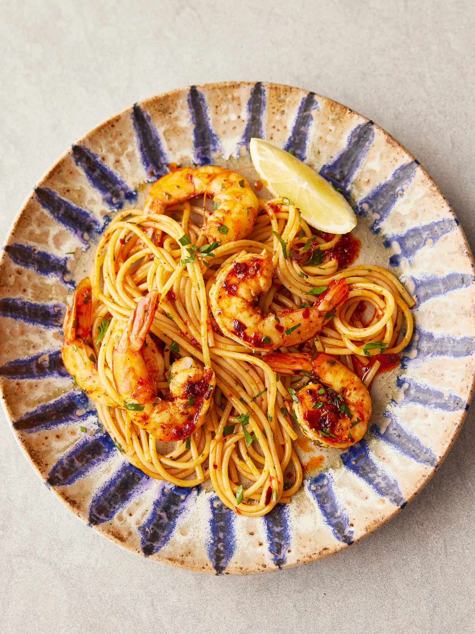 Harissa amplifies the sweetness of the prawns in this Tunisian pasta
