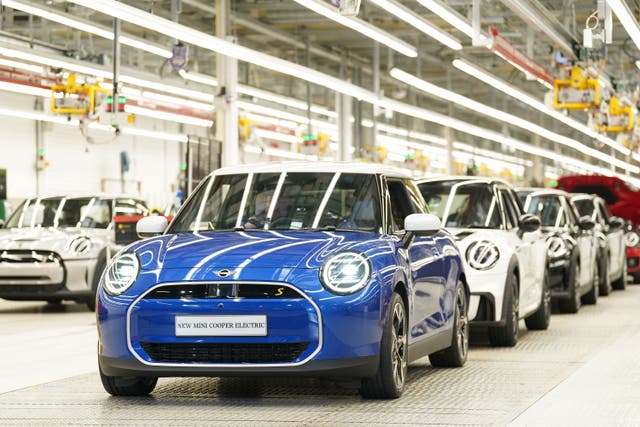 BMW has announced plans to invest ?600 million to prepare its Mini factory in Oxford to build new electric cars after securing Government funding (Joe Giddens/PA)