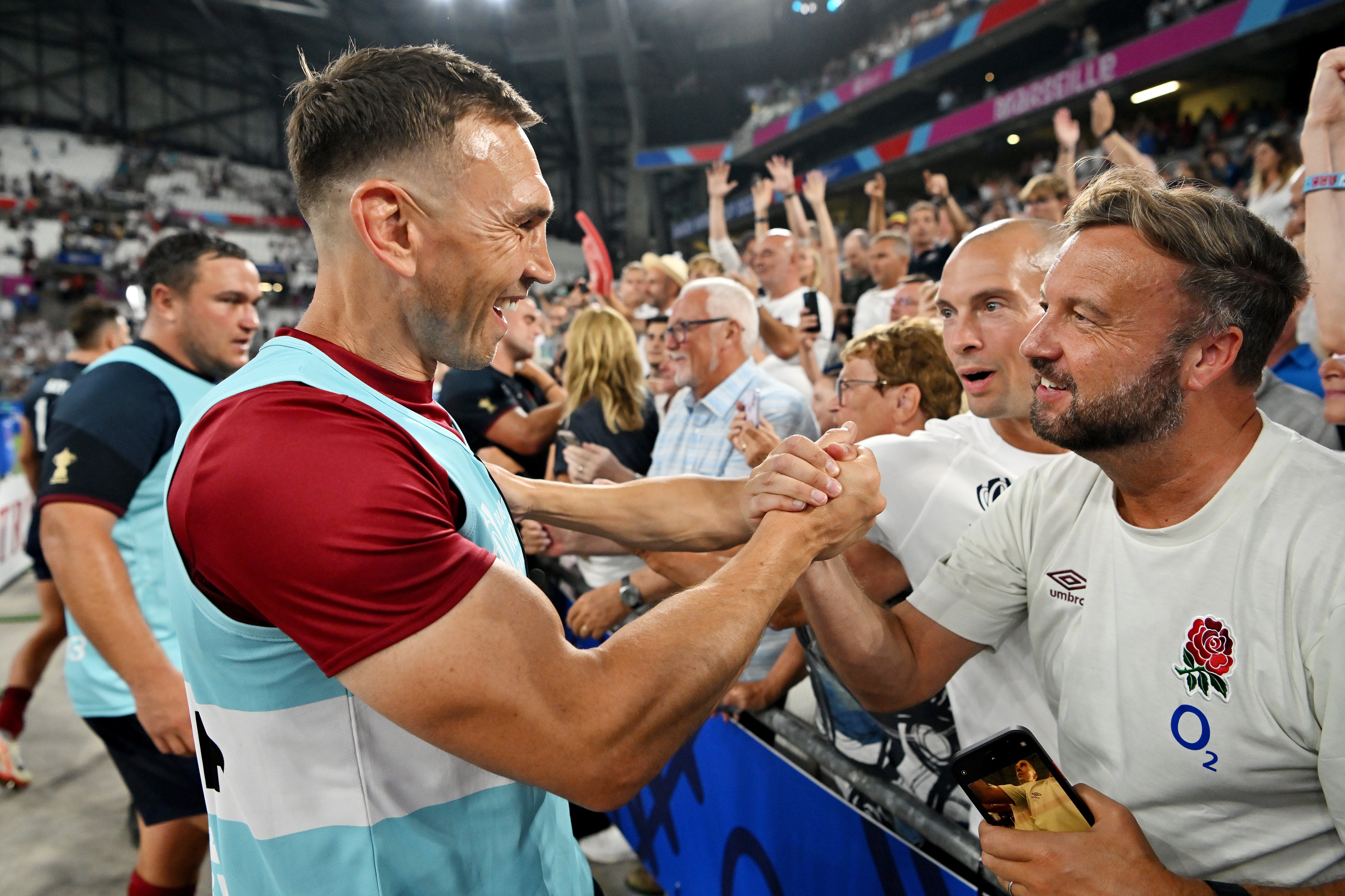 Sinfield celebrates with fans at full-time after England beat Argentina (Photo by Dan Mullan/Getty)