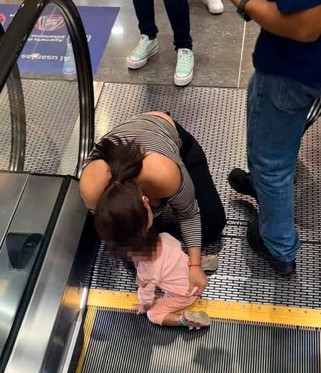 The two-year-old nearly lost her fingers after trapping her hand in the jagged guard at the bottom of an escalator