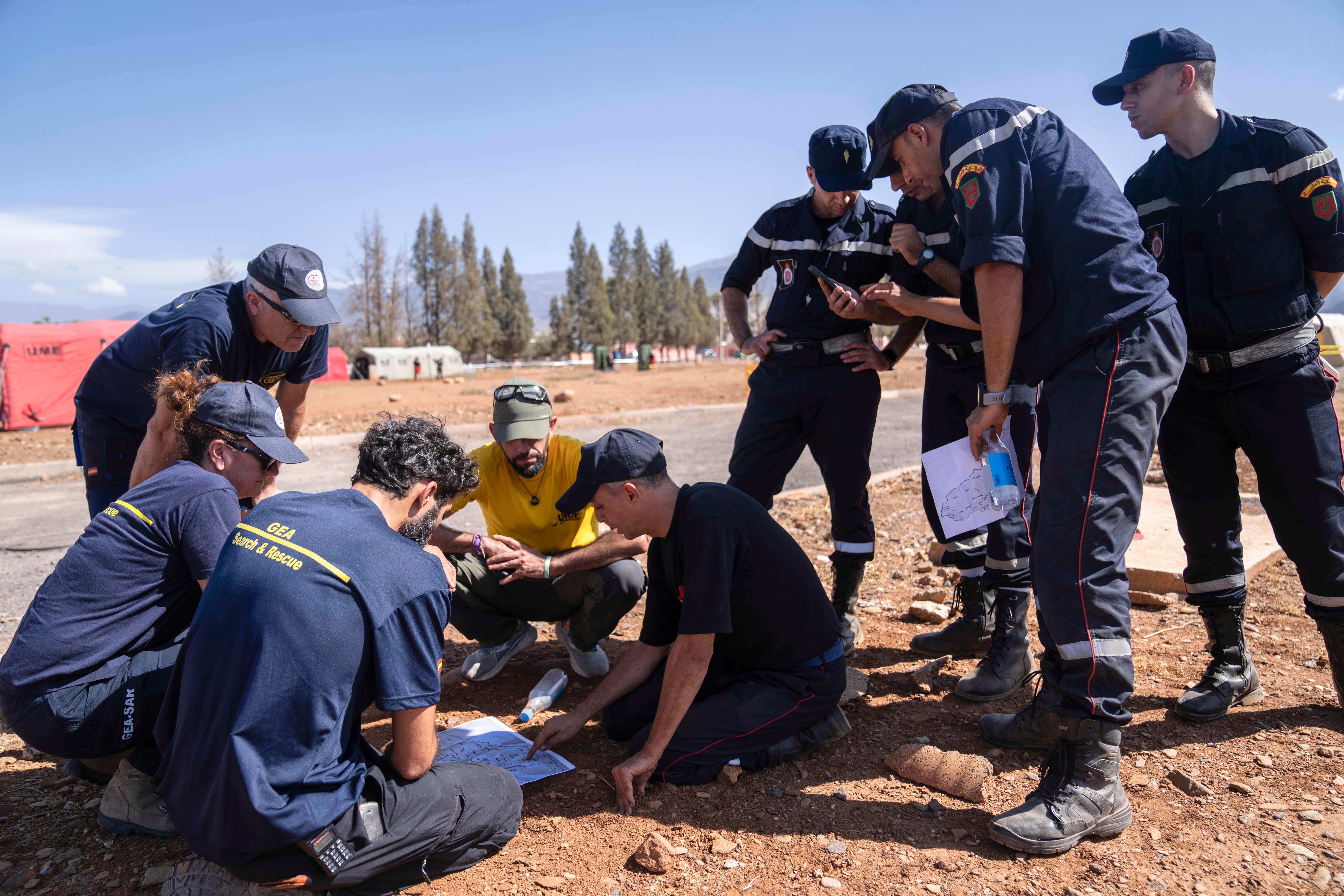 File photo: Moroccan and Spanish emergency units discuss plans at a military camp in the town of Amizmiz