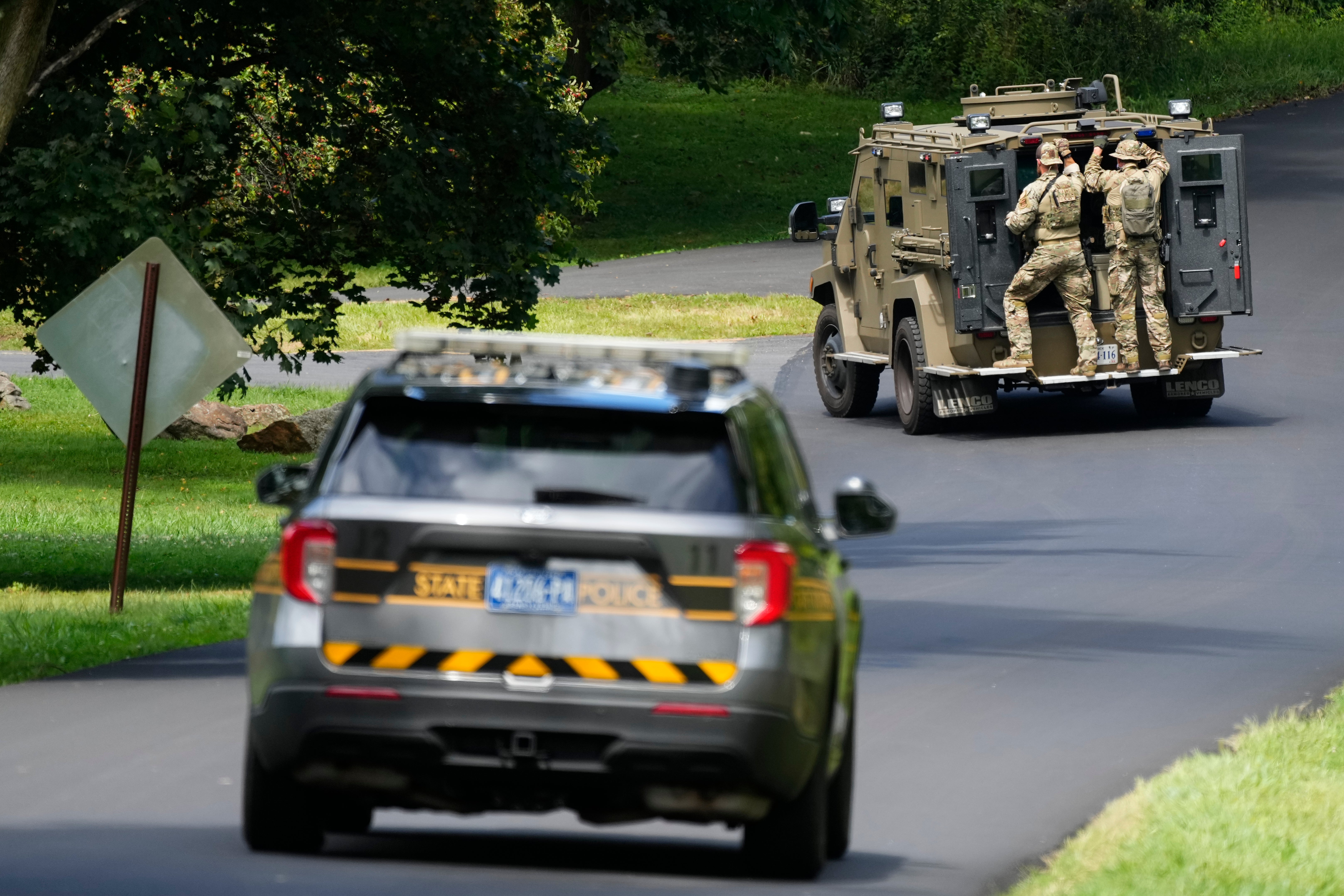 Law enforcement officers continue the search for Cavalcante