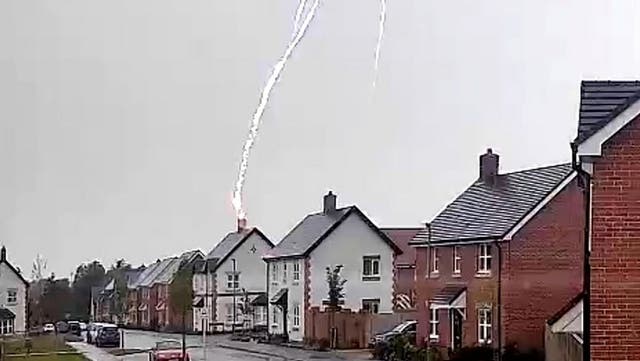 <p>Moment lightning bolt strikes couple’s home and blasts chimney off roof in Oxfordshire</p>