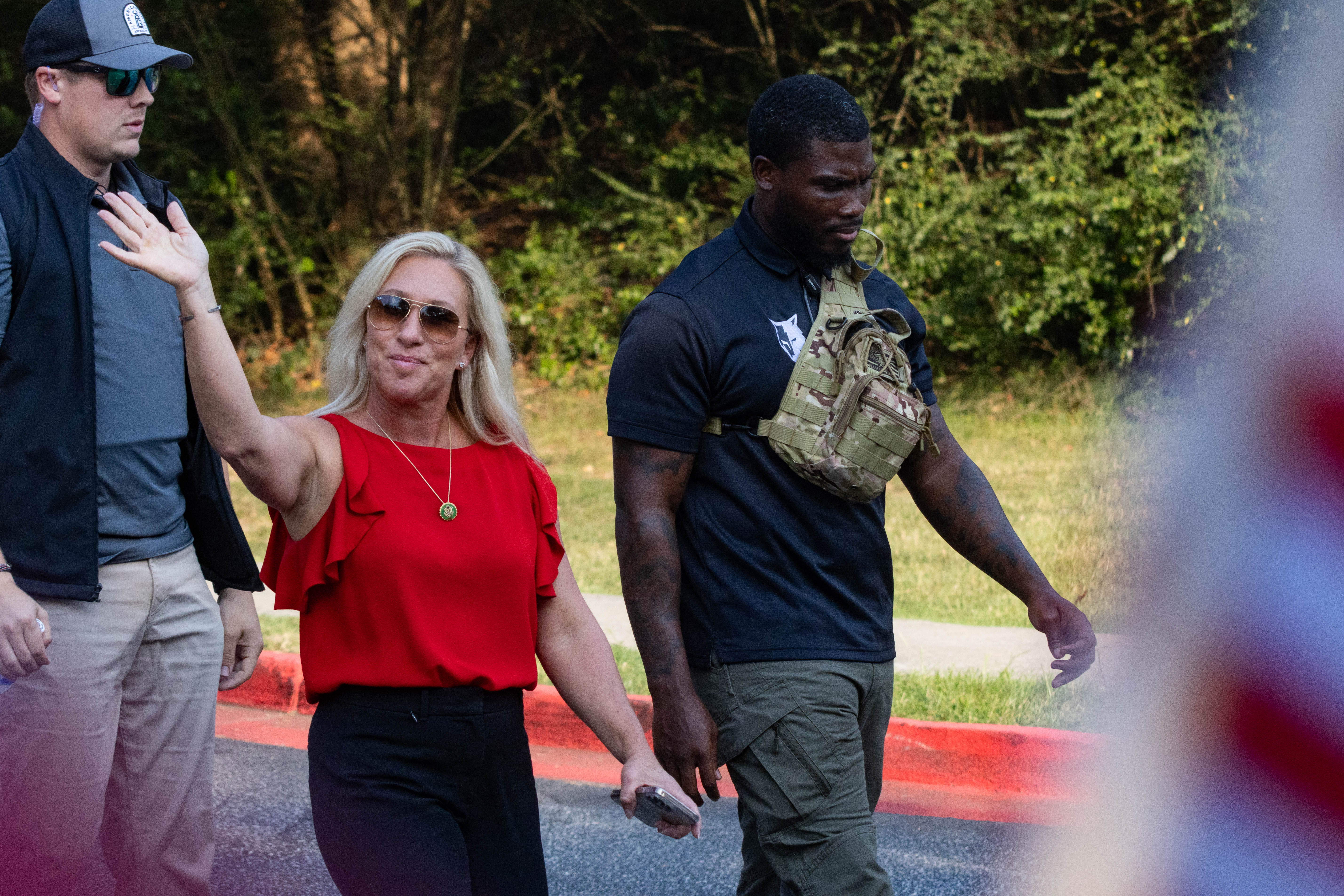 Representative Marjorie Taylor Greene (R-GA) arrives to speak to the media as they wait the arrival of former President Donald Trump outside the Fulton County Jail on August 24, 2023, in Atlanta, Georgia