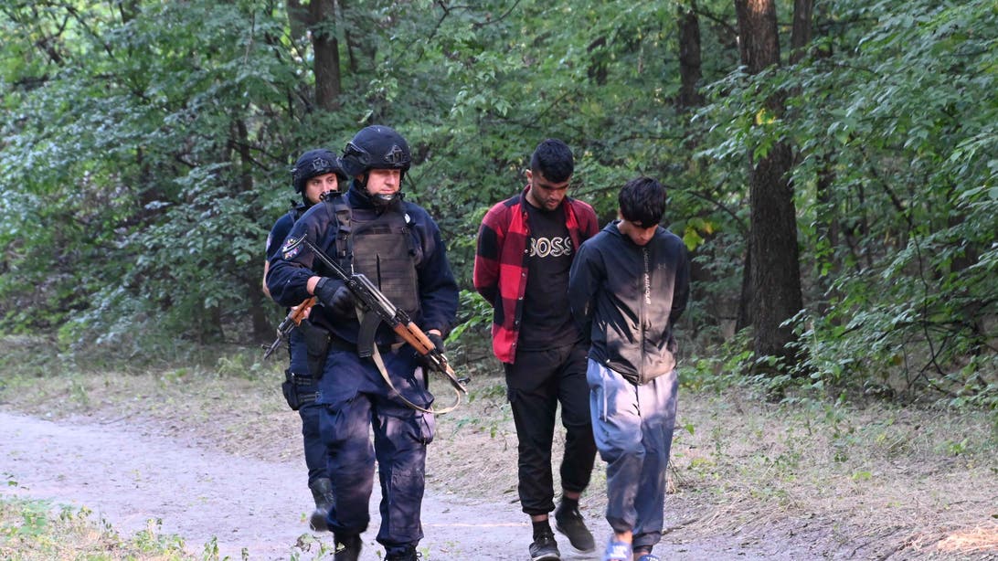 Offset Border Police round up migrants in Serbia and report finding weapons in raid ...