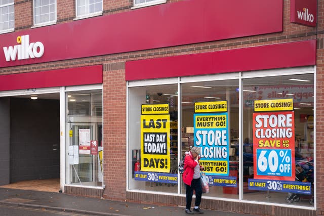 Customers walk past Wilko in Brownhills near Walsall, one of the first Wilko stores to close (Joe Giddens/PA)