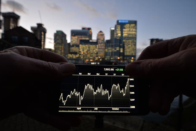 The FTSE 100 was boosted by banking sector shares (John Stillwell/PA)