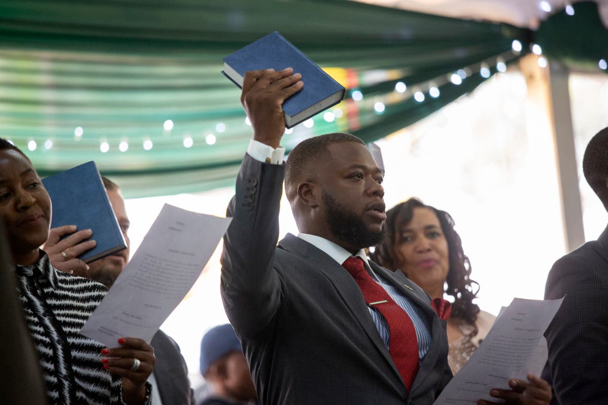 Zimbabwe's newly re-elected president appoints his son and nephew to