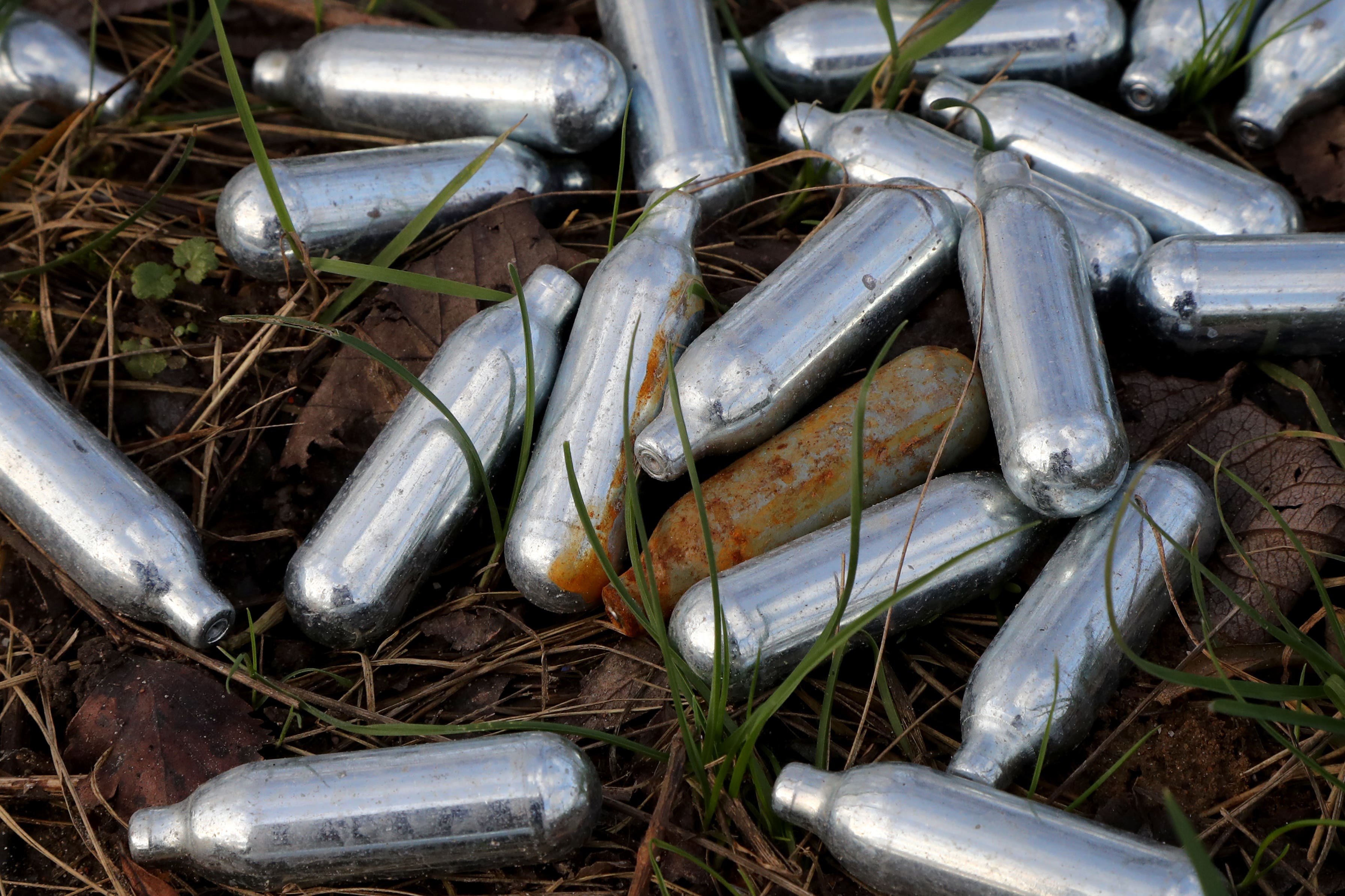 File photo: Laughing gas cannisters strewn on the ground