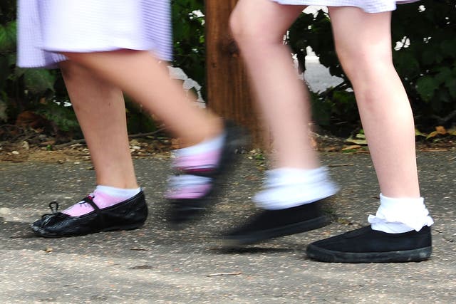 Happiness levels among girls and young women are at a 15-year low, new research by Girlguiding suggests (Ian West/PA)
