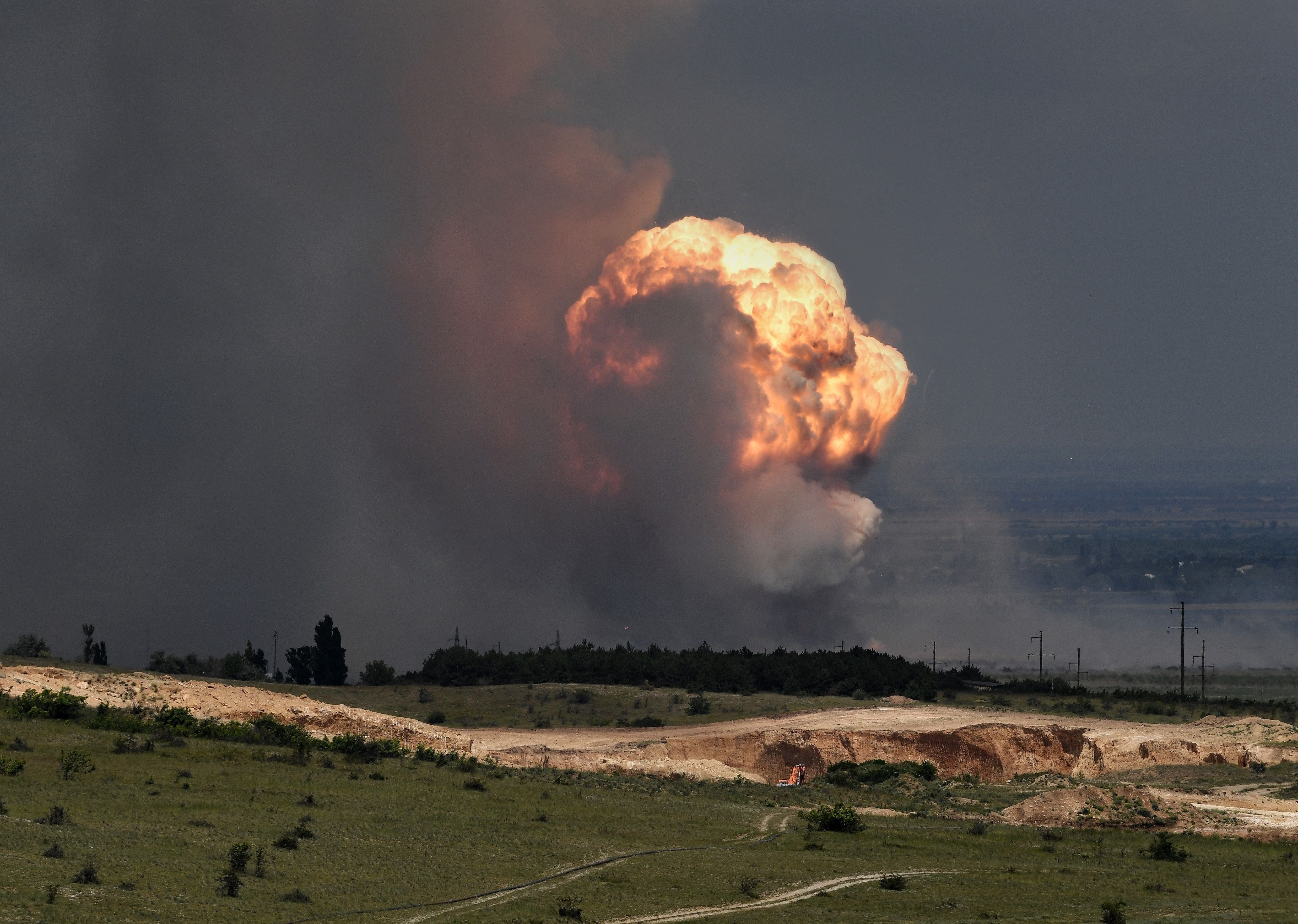 Detonation of ammunition caused by a fire at a military training field in Crimea