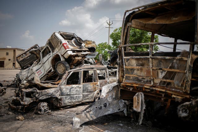 <p>Burnt vehicles are pictured following clashes between Hindus and Muslims in Nuh district of the northern state of Haryana, India, 1 August 2023</p>