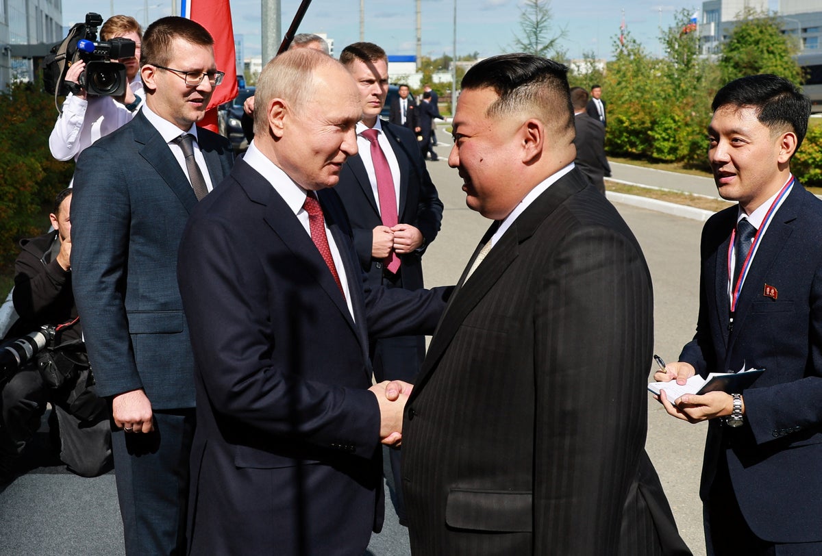 Ukraine-Russia war – live: Putin and Kim shake hands for 40 seconds as weapons talks begin