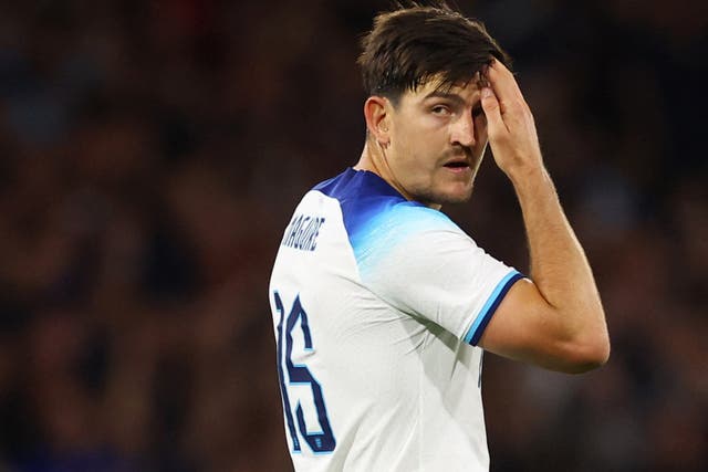 <p>England's Harry Maguire looks dejected after scoring an own goal</p>