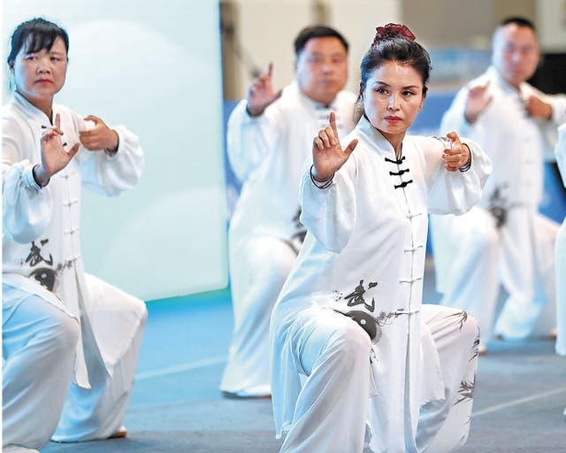<p><em>Baduanjin</em> competitors at the recently held 11th Session of National Traditional Sports in Beijing </p>