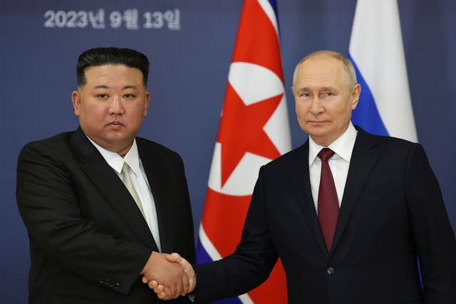 <p>Vladimir Putin and Kim Jong-un shake hands during their meeting at the Vostochny Cosmodrome in the far eastern Amur region of Russia, on Wednesday</p>