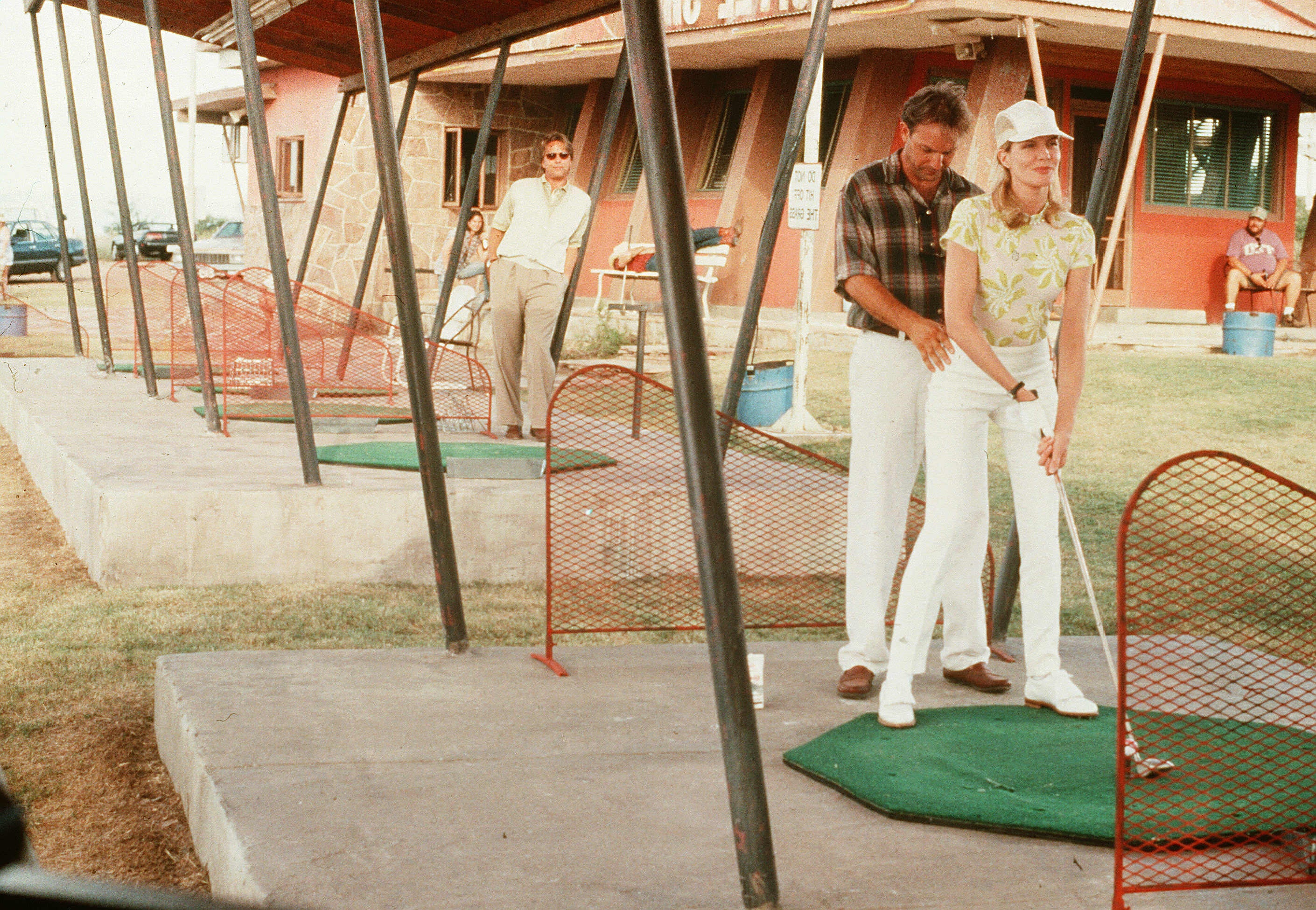 Costner and Rene Russo in the American romantic comedy and sports film ‘Tin Cup’ in 1996