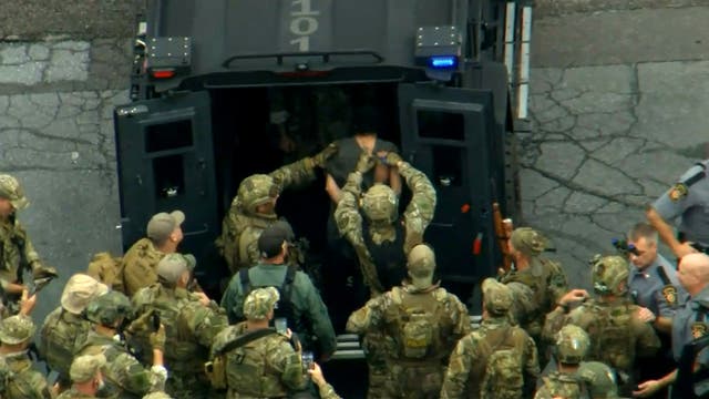 Pennsylvania police pose with captured Danelo Cavalcante after he led ...