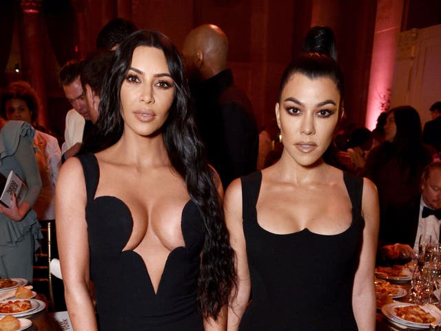 <p>Kim Kardashian (left) with her sister, Kourtney</p>