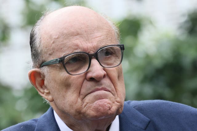 <p>Rudy Giuliani demanded a 10 per cent stake in PayPal in return for becoming a political fixer, according to a new Elon Musk biography </p>