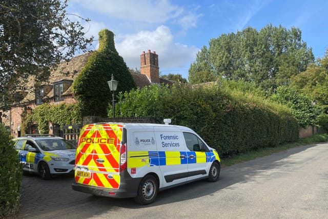 A property in Lady’s Drove, Emneth, Norfolk, is sealed off by police (Sam Russell/PA)