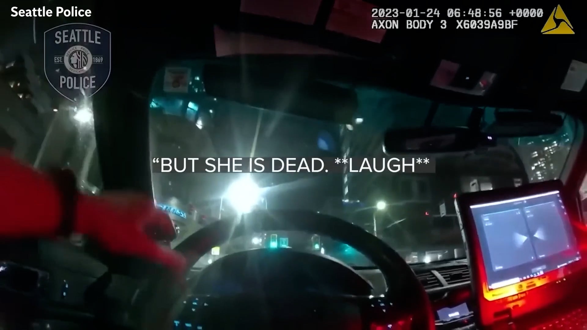 Shocking body cam footage shows a police officer laughing about a woman who was struck and killed by a patrol car in Seattle