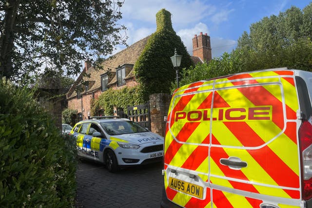 A property in Lady’s Drove, Emneth, Norfolk, was sealed off by police after a woman was found dead (Sam Russell/ PA)