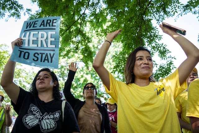 <p>Immigration advocates rally to urge Congress to pass permanent protections for DACA recipients and create a pathway to citizenship, near the U.S. Capitol June 15, 2022 in Washington, DC</p>