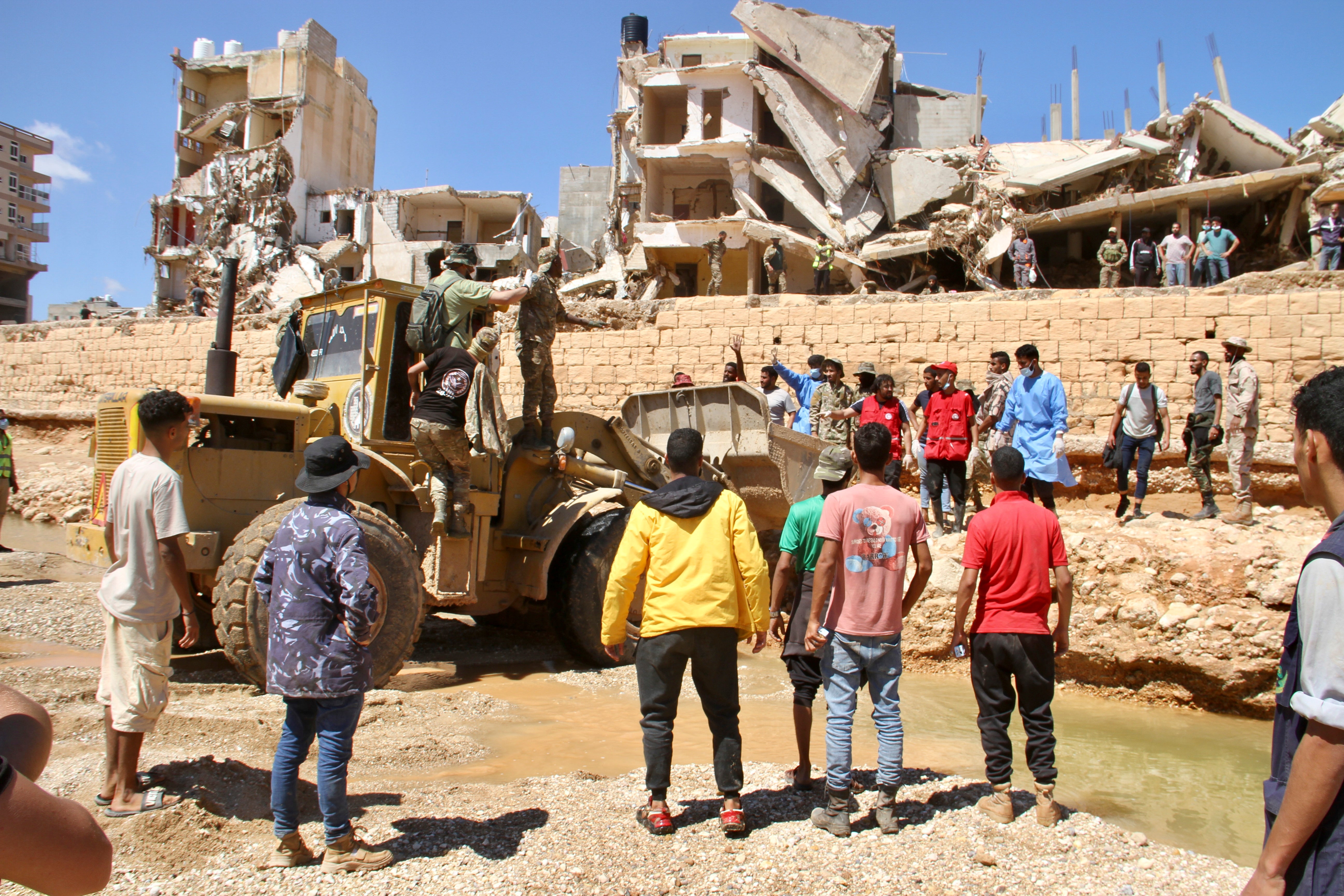 People look for survivors in Derna